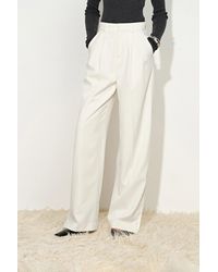 Fabrique - Olivia Button Slit Wide Leg Pants - Lyst