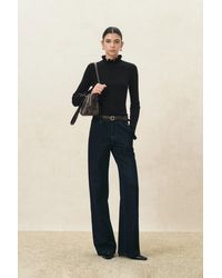 Fabrique - Lieve Ruffle Trim Fitted Turtleneck Top - Lyst