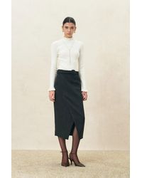 Fabrique - Lieve Ruffle Trimmed Fitted Turtleneck Top - Lyst