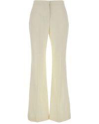 Givenchy - Wool Flared Trousers - Lyst