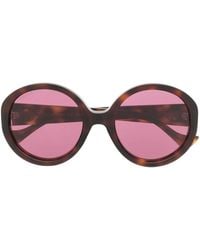 Gucci - Sonnenbrille Mit Logo-Schild - Lyst