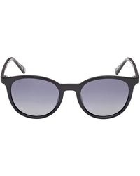 GUESS EYEWEAR - Gafas de sol con montura redonda - Lyst
