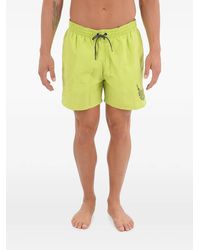 Nike - Logo-Print Elasticated Swim Shorts - Lyst