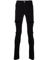 Amiri - Distressed-Effect Skinny Jeans - Lyst