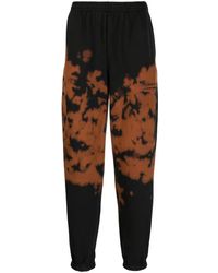 Children of the discordance - Logo-Print Cotton-Blend Track Pants - Lyst