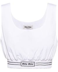 Miu Miu - Top corto con logo bordado - Lyst