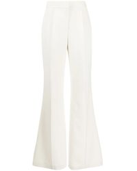 Elie Saab - Pressed-Crease Cady Flared Trousers - Lyst
