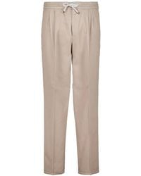 Brunello Cucinelli - Drawstring Pleated Cotton Trousers - Lyst