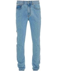 JW Anderson - Slim-Fit-Jeans mit Logo-Patch - Lyst