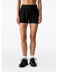 PUMA - Dreamrun Drycell Layered Logo-Print Shorts - Lyst