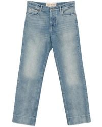 Valentino Garavani - Logo-Patch Jeans - Lyst