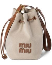 Miu Miu - Logo-appliquéd Canvas Bucket Bag - Lyst