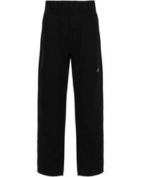 Roa - Logo-embroidered Canvas Trousers - Lyst