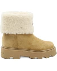 Moncler - Aurea Shearling Logo-Patch Boots - Lyst