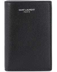 Saint Laurent - Portefeuille en cuir a logo - Lyst