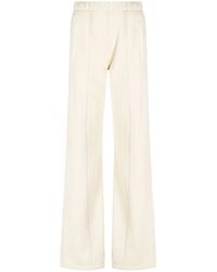 Amiri - Flared-Leg Jersey Trousers - Lyst
