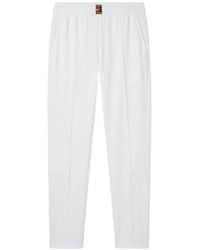 Nike - Logo-Patch Performance Track Pants - Lyst