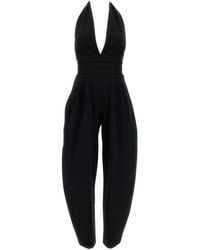 ANDAMANE - Sandra Halterneck Pleated Jumpsuit - Lyst