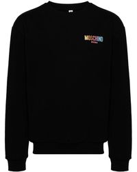 Moschino - Sweatshirt mit Logo-Stickerei - Lyst