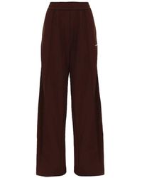 Moncler - Logo-Print Wide-Leg Track Pants - Lyst