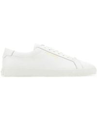 Saint Laurent - Geprägte Low-Top Sneakers - Lyst