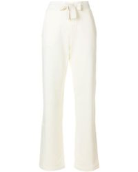 Moncler Pantalon de jogging évasé à fente latéral - Blanc