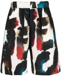 Alexander McQueen - Gerade Shorts mit Logo-Print - Lyst