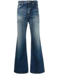 Saint Laurent - 70's Whiskering-Effect Bootcut Jeans - Lyst
