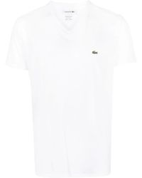 Lacoste - Camiseta con parche del logo y cuello en V - Lyst