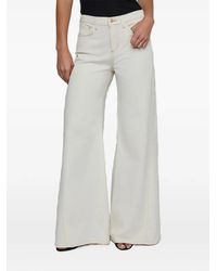 L'Agence - Flared Trousers - Lyst