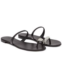Giuseppe Zanotti Sandalias planas con aplique de anilla - Negro