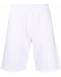 Pantalones cortos de deporte de color Blanco de hombre: hasta el 49 % de  descuento | Lyst