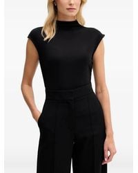 DKNY - Mock-Neck Ruched Top - Lyst