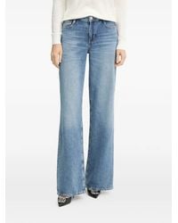 Guess - Triangle-Logo Jeans - Lyst