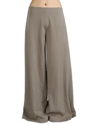The Row - Dela Flared Trousers - Lyst