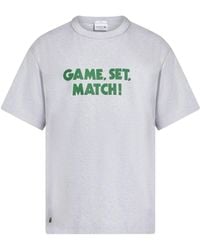 Lacoste - T-Shirt mit Slogan-Print - Lyst