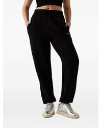 Guess - Rhinestone Logo Joggers - Lyst