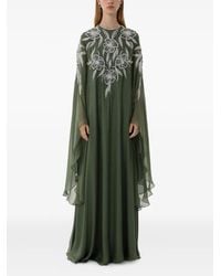 Dina Melwani - Floral Crystal-Embellished Cape-Sleeve Maxi Dress - Lyst