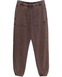 Champion - Pantalones de chándal con logo bordado - Lyst