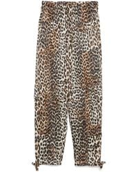 Ganni - Leopard Print Satin Trousers - Lyst