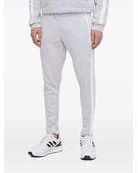 adidas - Stripe-Detail Track Pants - Lyst