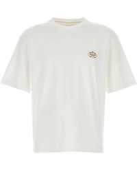 Prada - Camiseta con logo bordado - Lyst