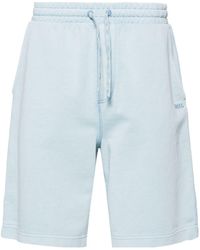 BOSS - Pantalones cortos de chándal con logo bordado - Lyst