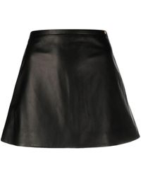 Versace - Minifalda con cremallera - Lyst