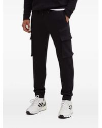 Guess - Jogginghose Mit Logo-Patch - Lyst