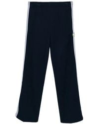 Lacoste - Logo-Patch Trousers - Lyst