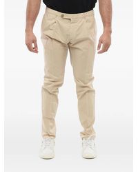 Corneliani - Pleated Chino Trousers - Lyst