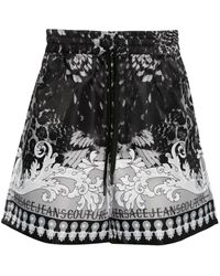 Versace - Shorts con stampa Watercolour Couture - Lyst