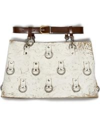 Prada - Ring-Detail Leather Mini Skirt - Lyst