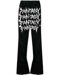 Kusikohc - Slogan-Print Straight-Leg Wool Trousers - Lyst